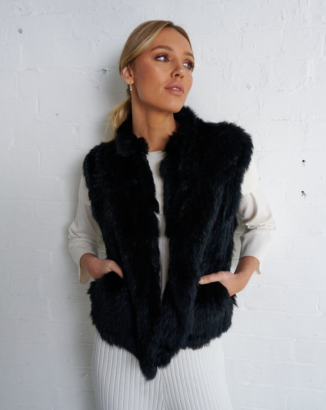 Black best sale feather vest